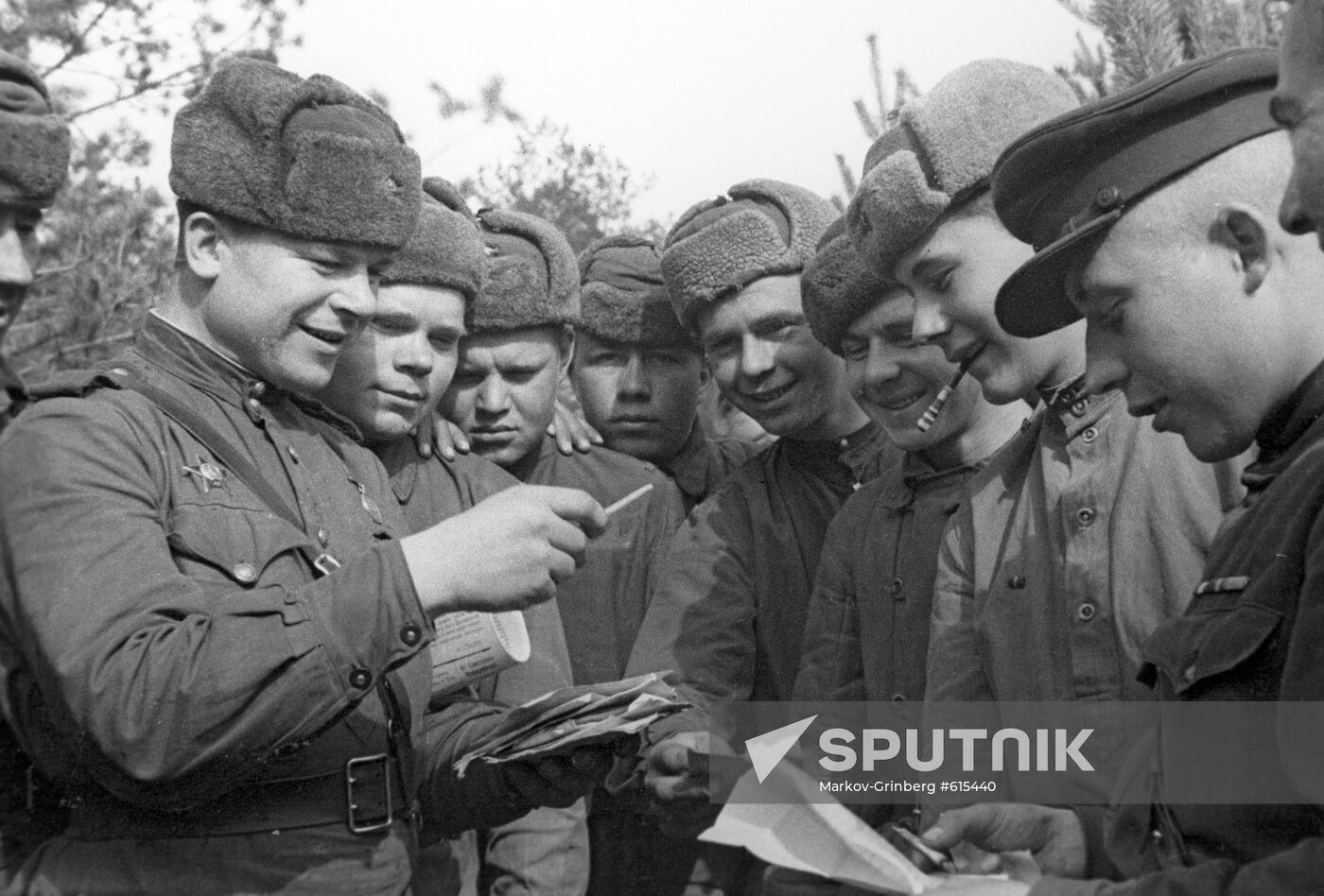 Soviet soldiers sort out the mail