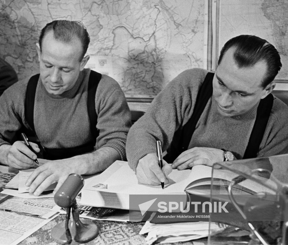 Pilot-cosmonauts Alexey Leonov and Pavel Belyayev at press conference in Perm