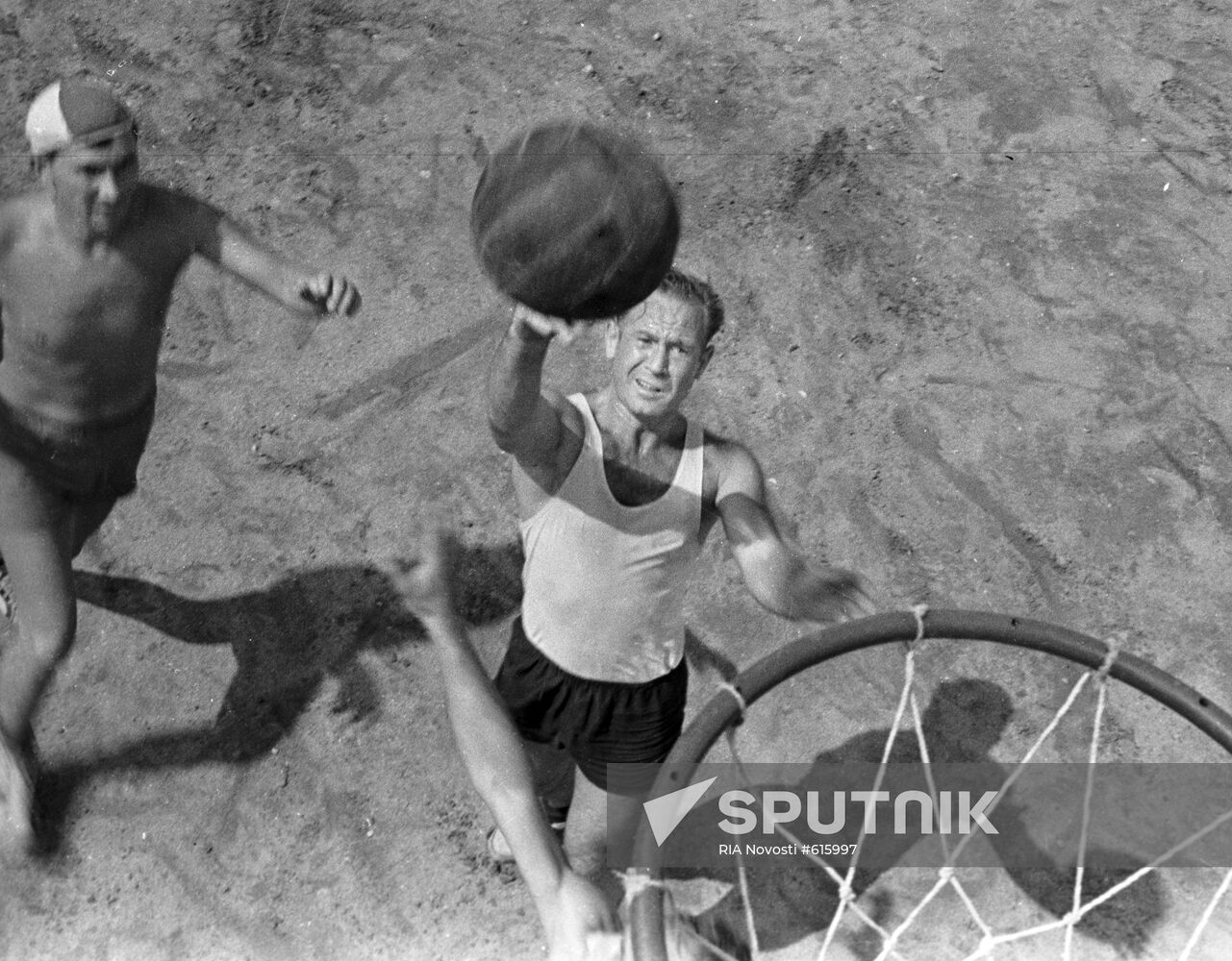 Soviet pilot-cosmonaut Alexei Leonov shooting basketball