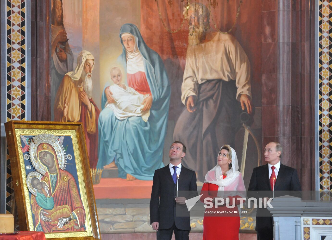 Dmitry Medvedev, Vladimir Putin during Easter service