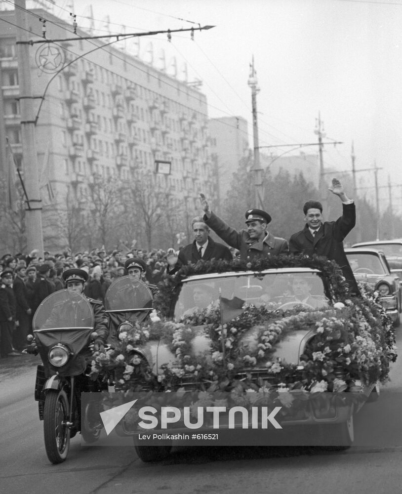 Red carpet welcome of cosmonauts Konstantin Feoktistov, Vladimir Komarov and Boris Egorov