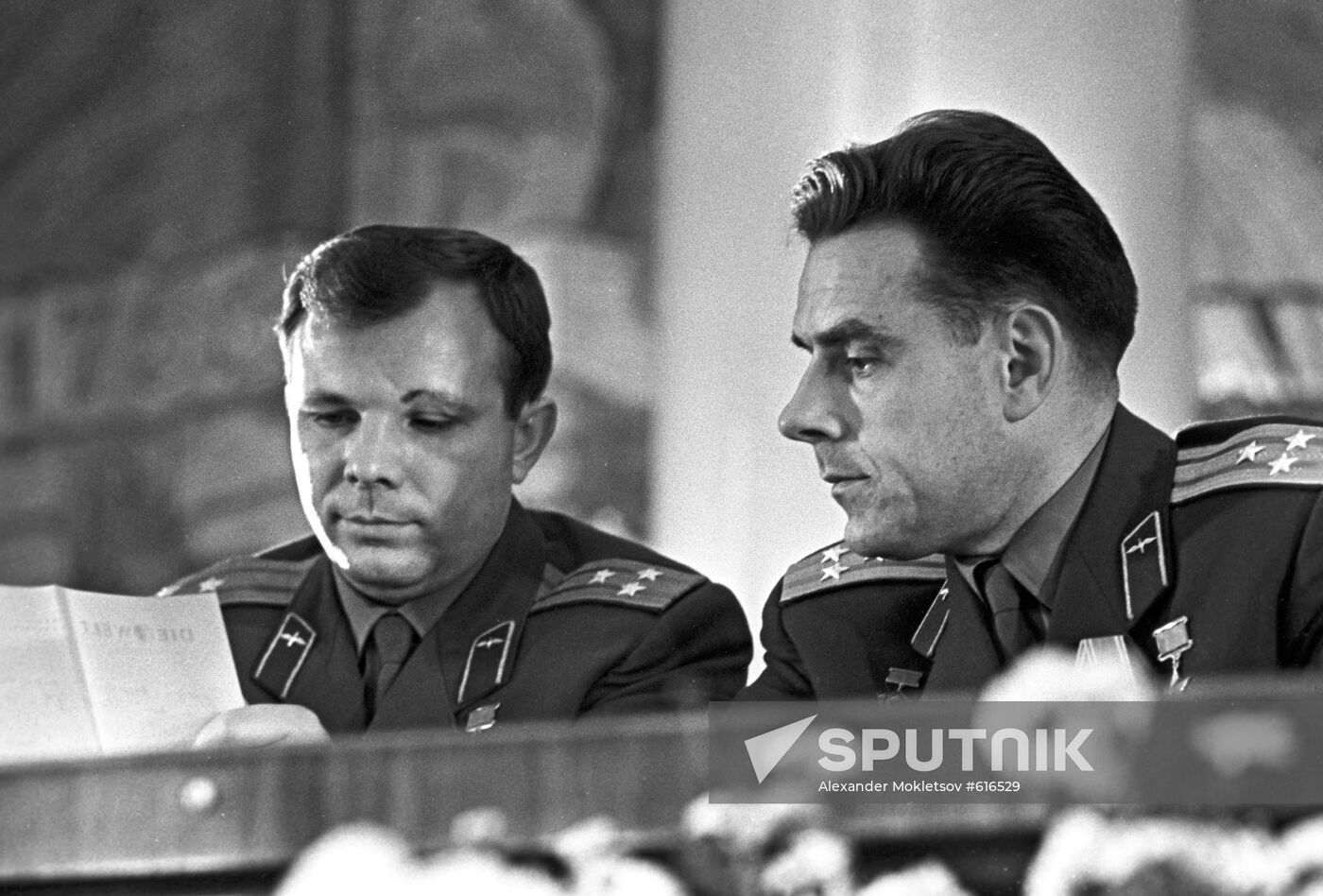 Soviet cosmonauts Yuri Gagarin (left) and Vladimir Komarov at press conference at Moscow State University