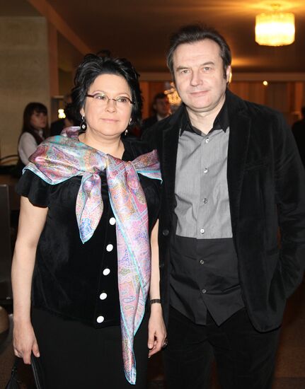 Alexei Uchitel with his spouse