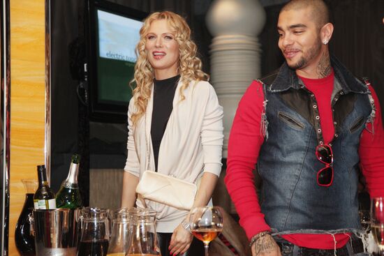 Olesya Sudzilovskaya and Timati