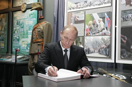 Vladimir Putin visits Katyn memorial