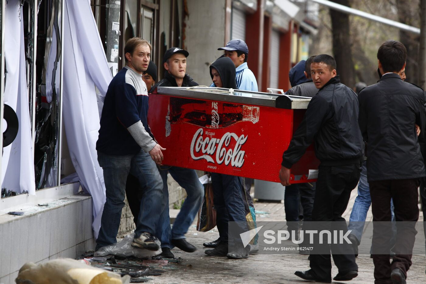 Owners of a store carry undamaged goods