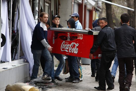 Owners of a store carry undamaged goods