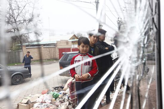 Smashed shop window in Bishkek