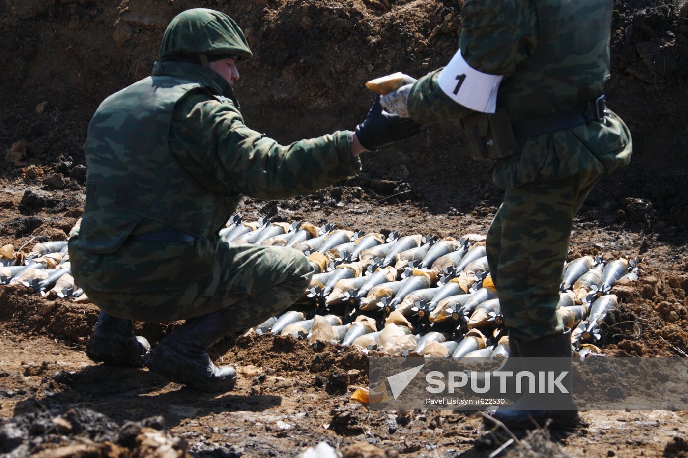 Overdue ammunition utilization in the Chebarcul ordnance yard.