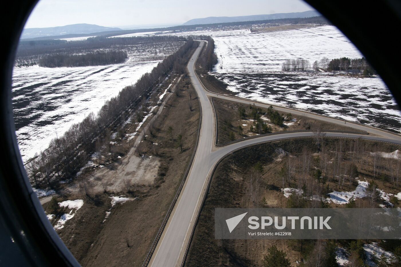 Police helicopter patrolling M-5 Ural federal highway