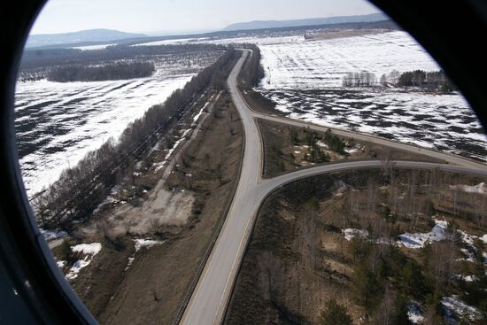 Police helicopter patrolling M-5 Ural federal highway