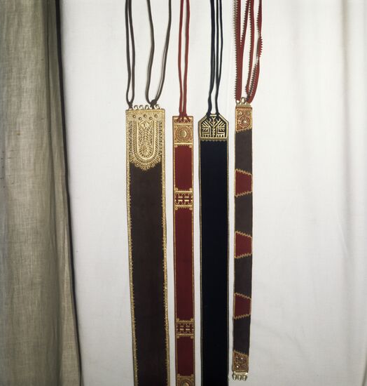 Belts with golden embroidery