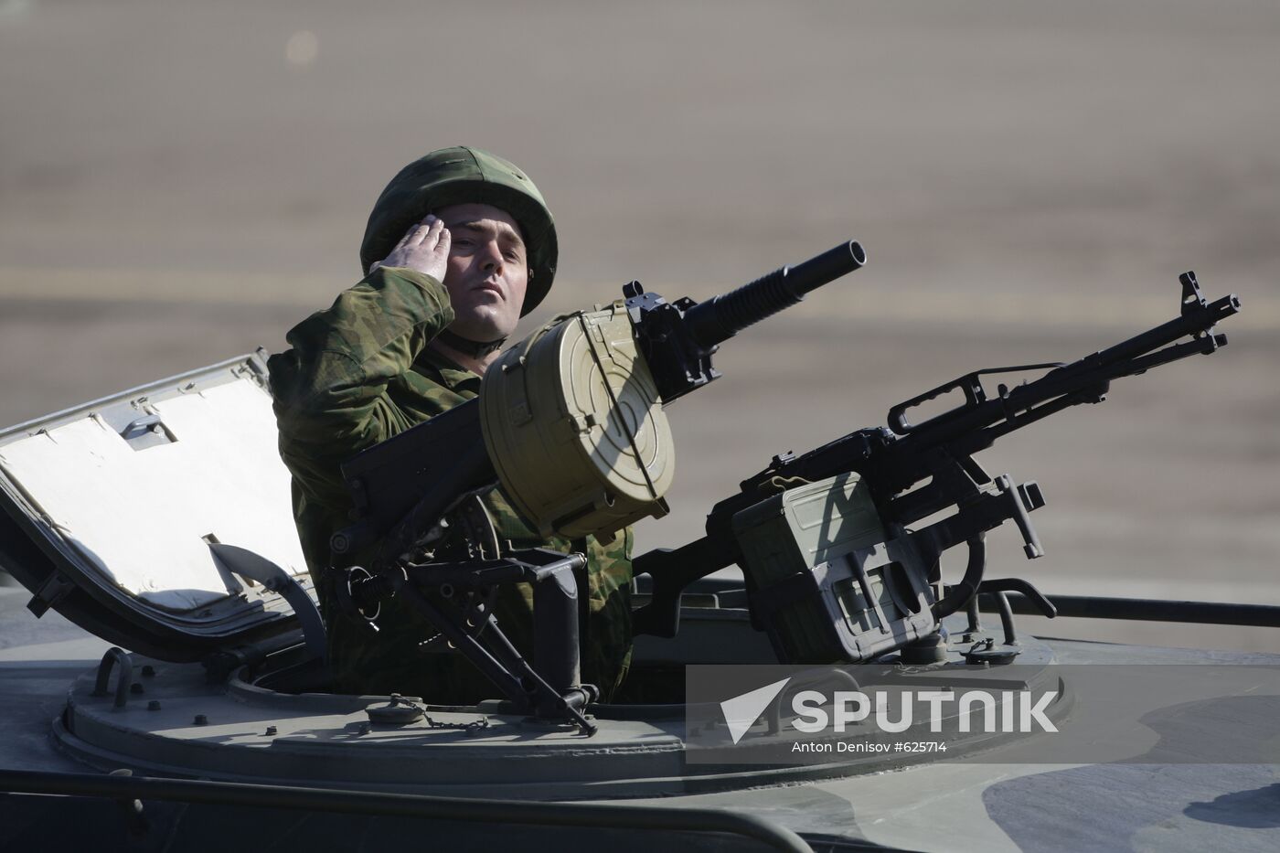 Tigr combat vehicle with arms