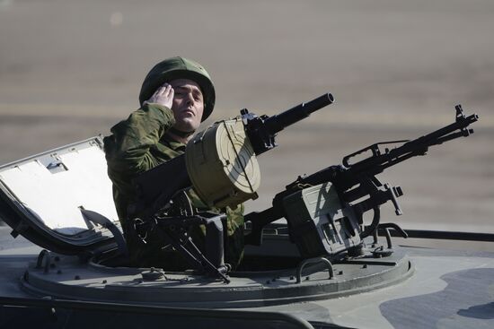 Tigr combat vehicle with arms