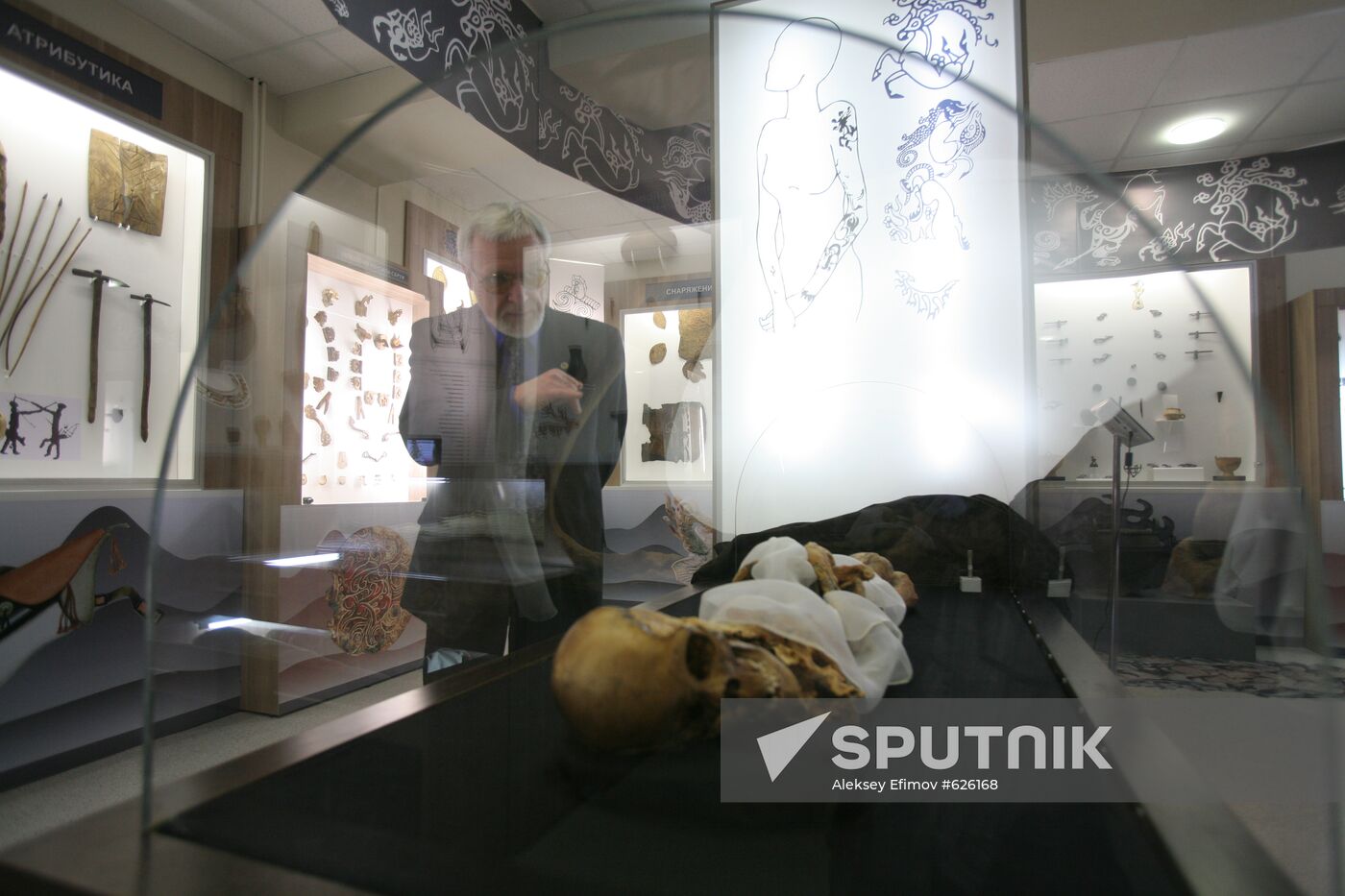 Vyacheslav Molodin examines "Altai Princess" mummy