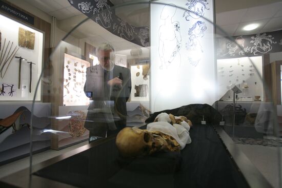 Vyacheslav Molodin examines "Altai Princess" mummy