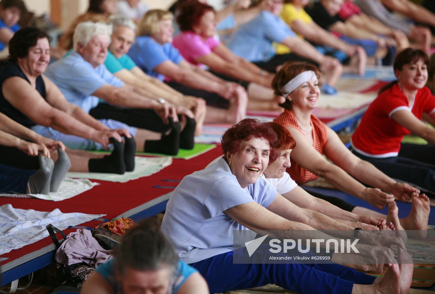 Elderly people doing Hatha Yoga