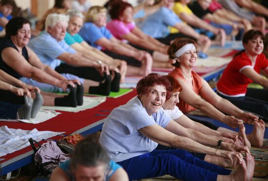 Elderly people doing Hatha Yoga