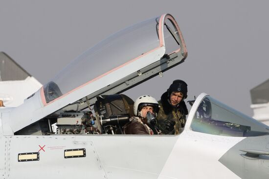 Pilot examining Mig-29SMT fighter