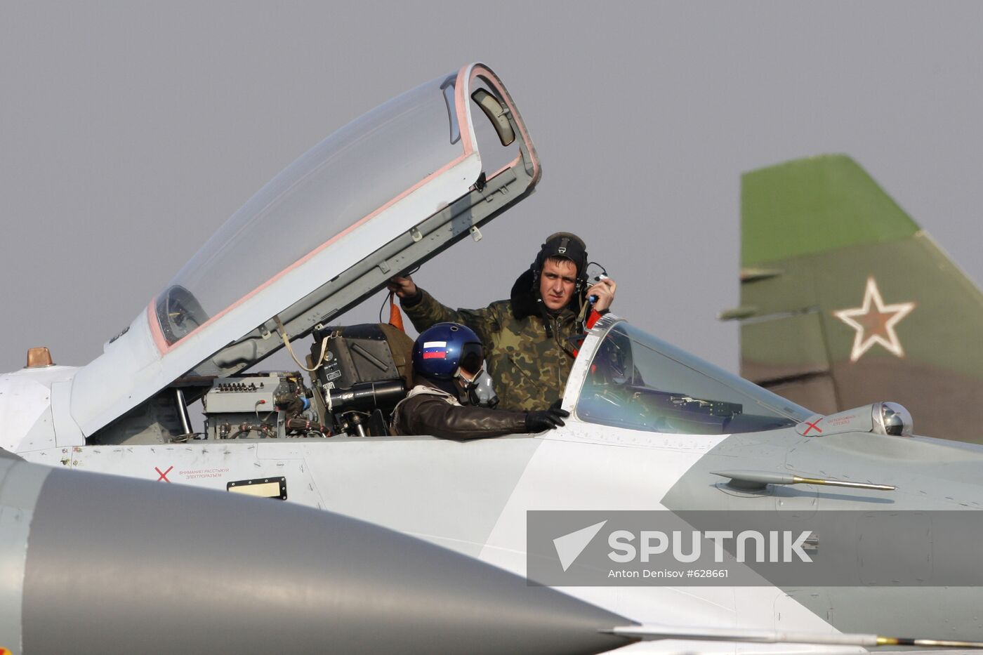 Pilot examining Mig-29SMT fighter