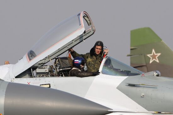 Pilot examining Mig-29SMT fighter