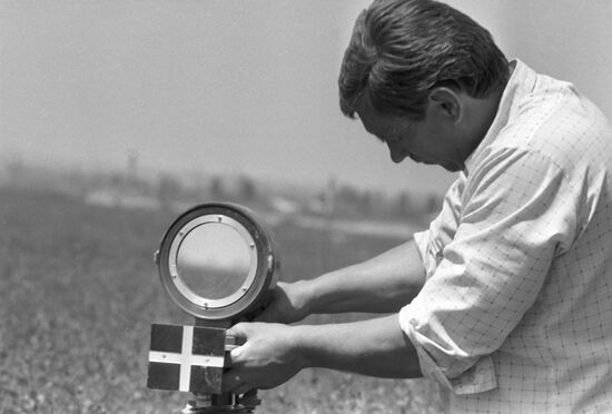 Agronomist with moisture gauge
