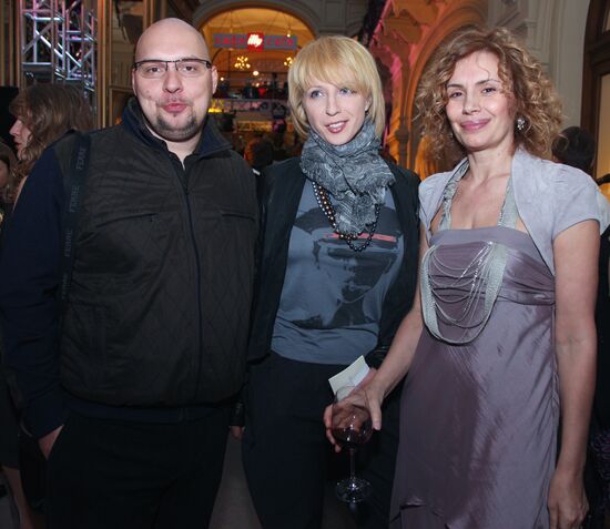 Yana Churikova with her husband and Victoria Saava