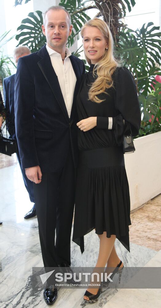 Olesya Sudzilovskaya with her husband