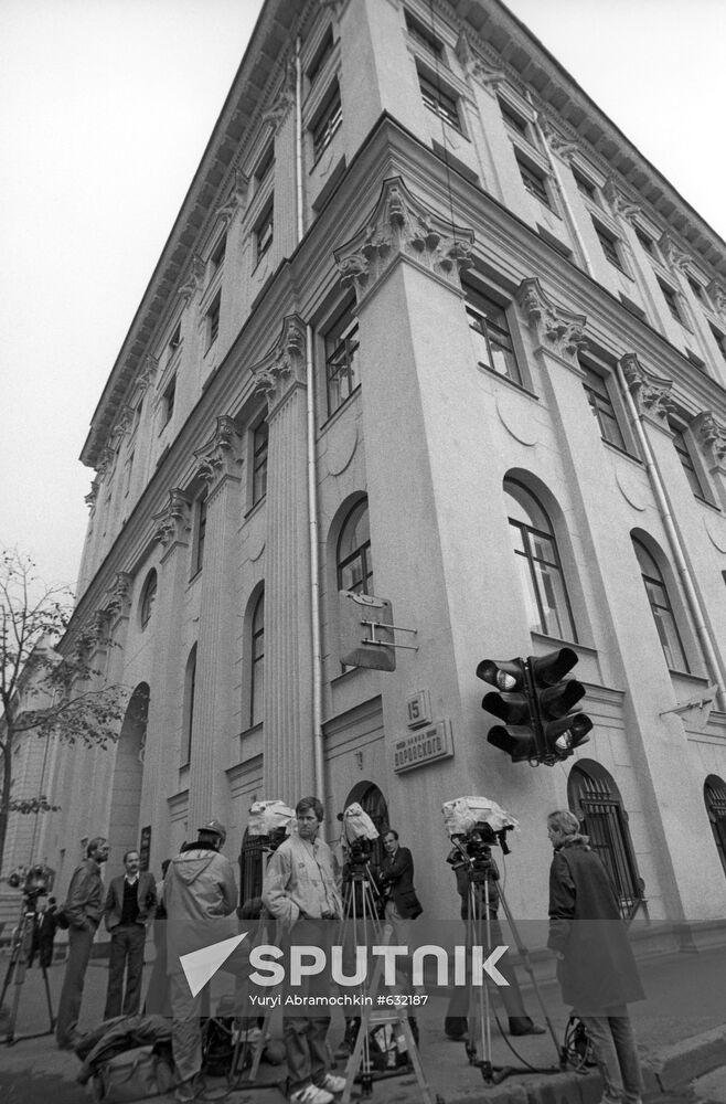 Journalists in front of courthouse