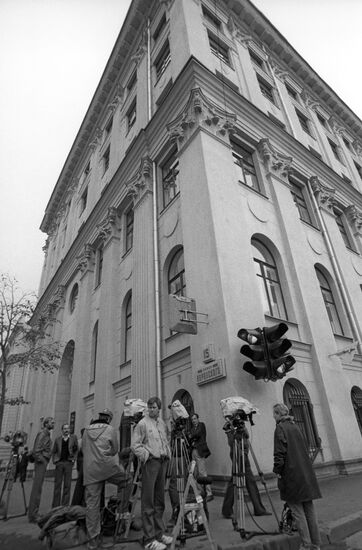 Journalists in front of courthouse