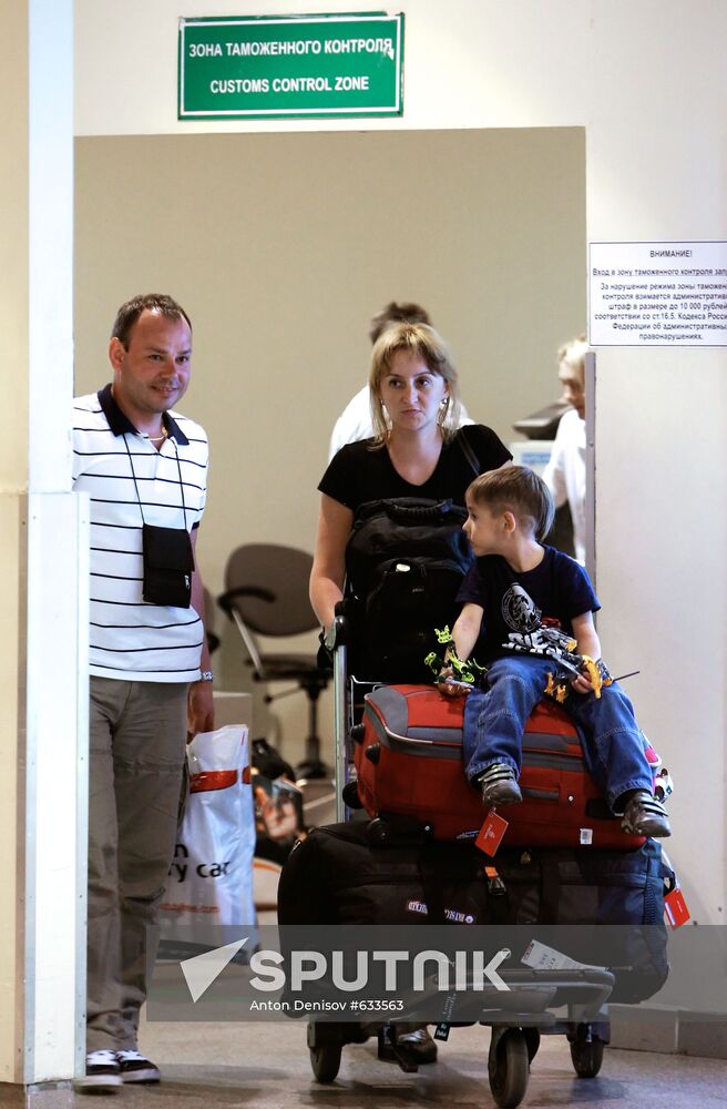 Passengers arrive at Domodedovo airport from London
