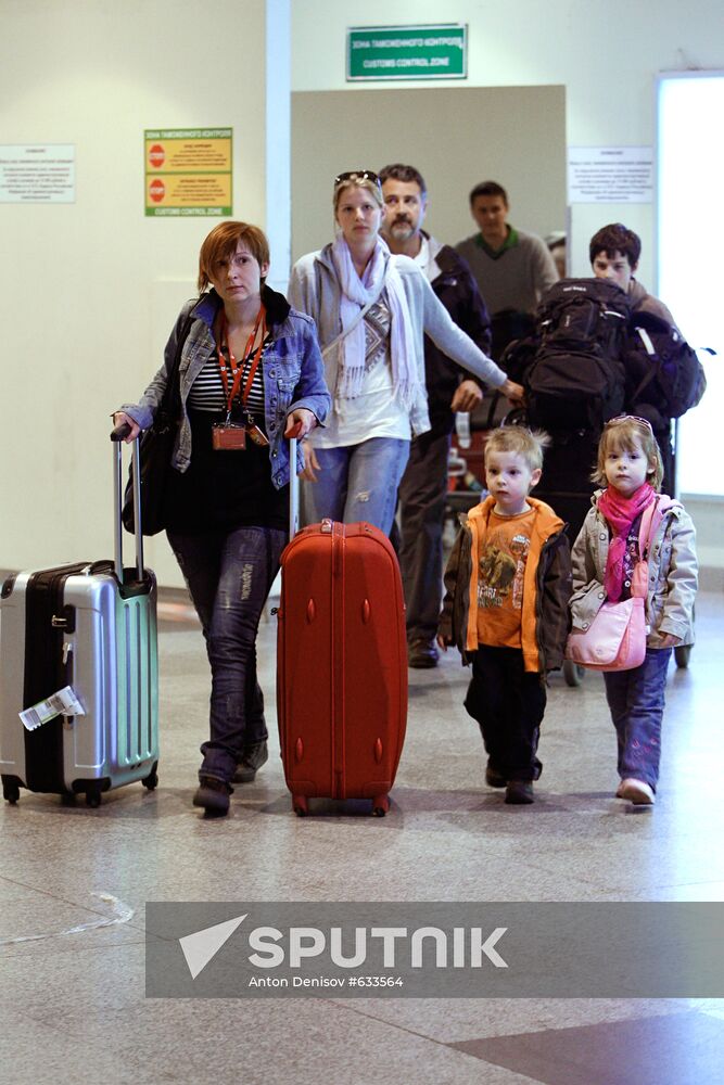 Passengers arrive at Domodedovo airport from London