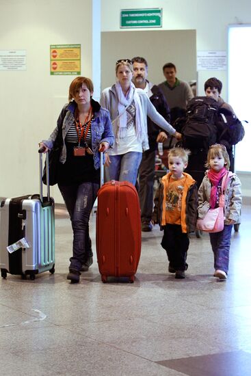 Passengers arrive at Domodedovo airport from London