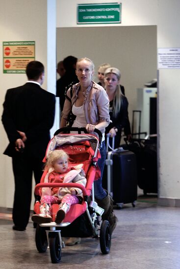 Passengers arrive at Domodedovo airport from London