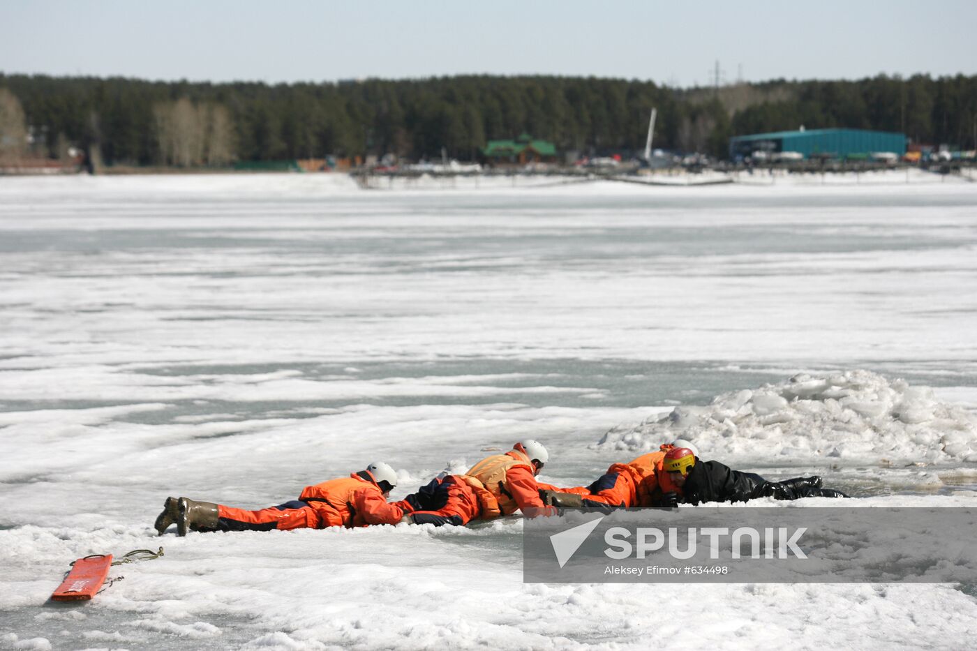 Exhibition rescue drill with people in distress on ice