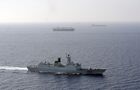 Foreign warship escorts vessels in Gulf of Aden
