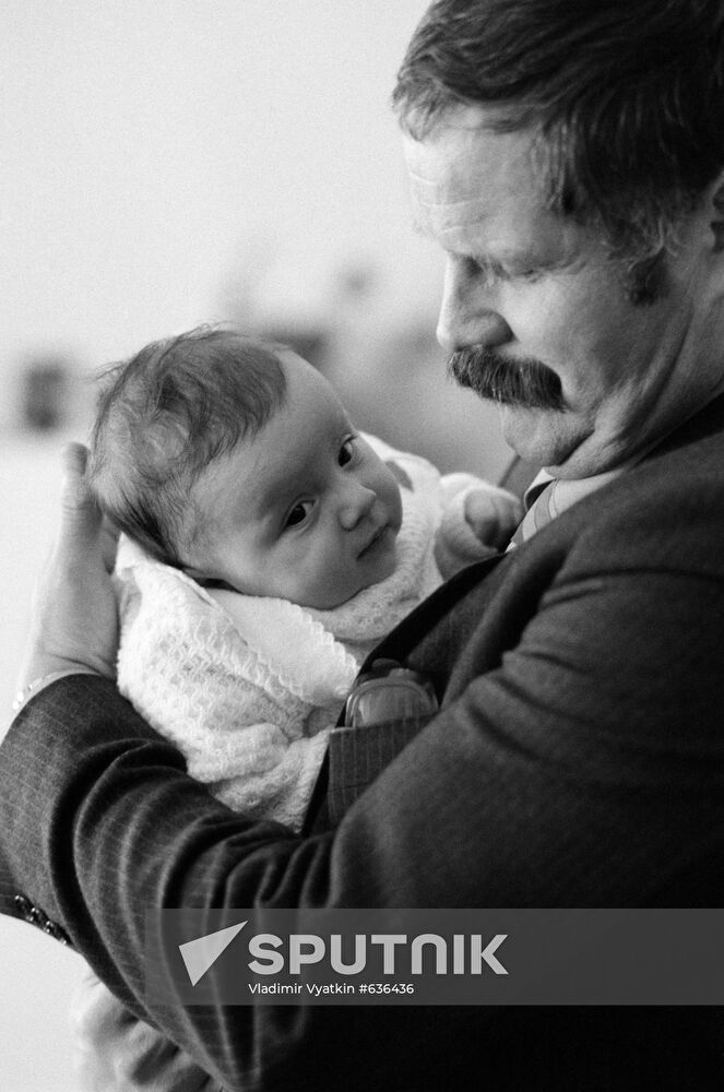 Professor Boris Leonov with a test-tube baby