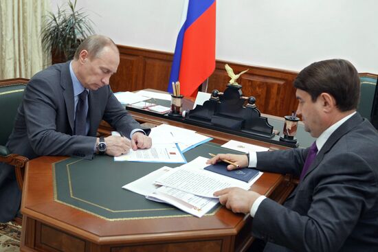 Vladimir Putin meets with Igor Levitin in Sochi
