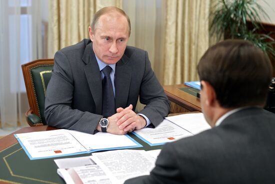 Vladimir Putin meets with Igor Levitin in Sochi
