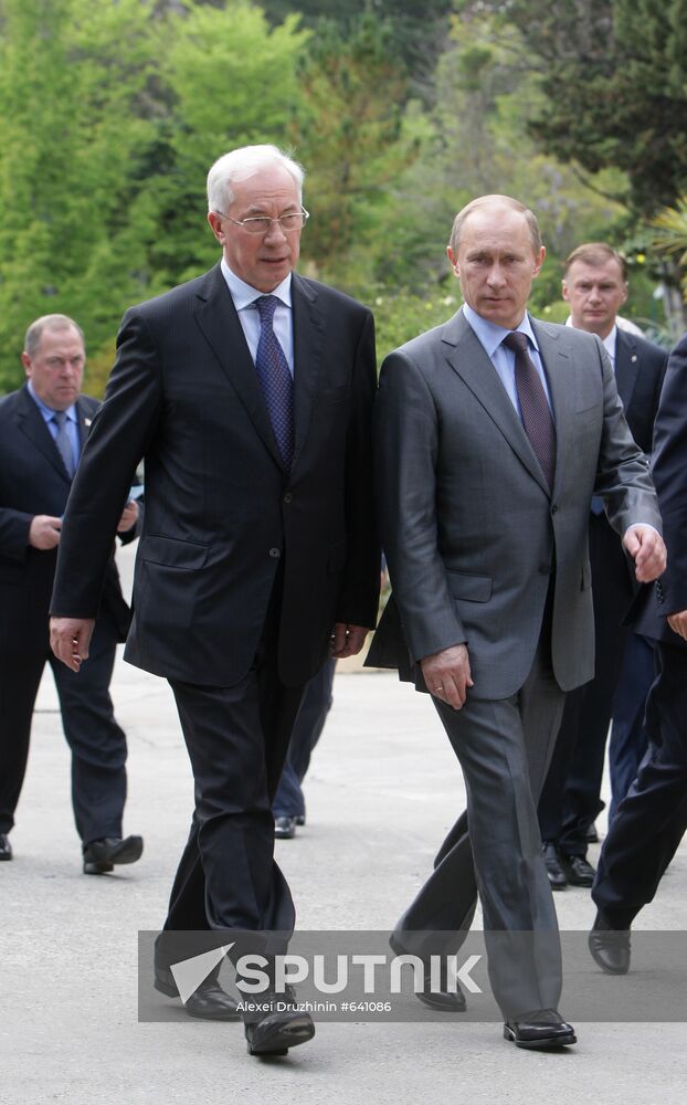 Vladimir Putin and Nikolai Azarov