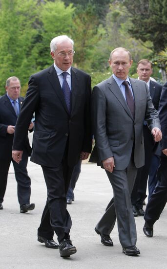 Vladimir Putin and Nikolai Azarov