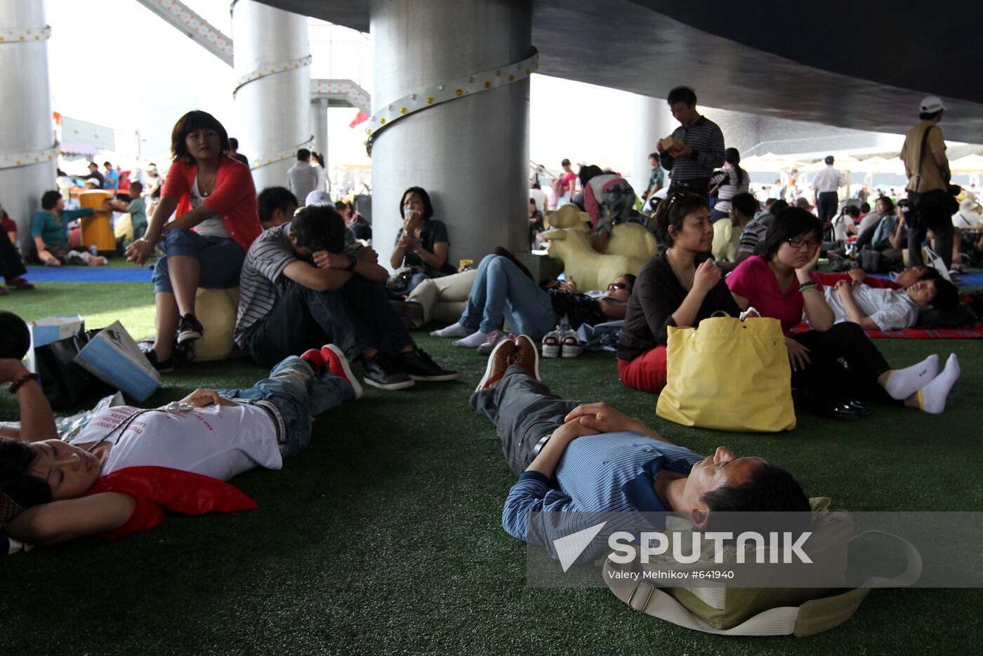 Visitors attend Shanghai World Expo 2010