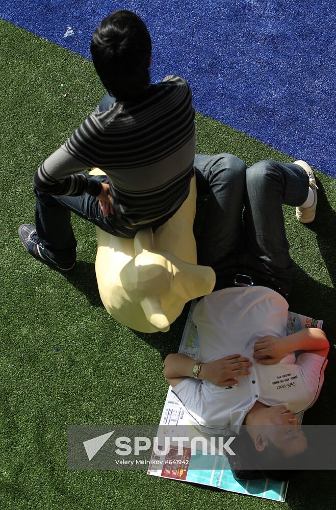 Visitors attend Shanghai World Expo 2010