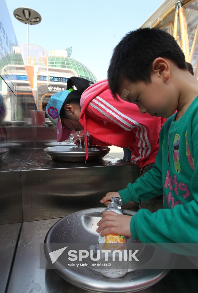 Visitors use drinking fountains World Expo 2010 Shanghai