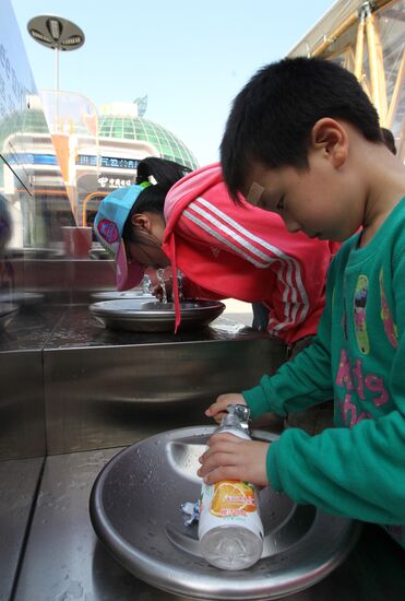 Visitors use drinking fountains World Expo 2010 Shanghai
