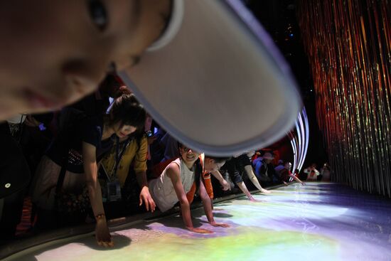 Visitors view Canada Pavilion exhibit at World Expo 2010