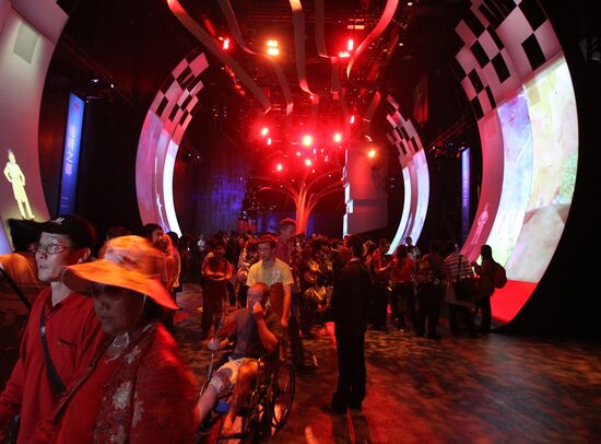 Visitors view Canada Pavilion exhibit at World Expo 2010