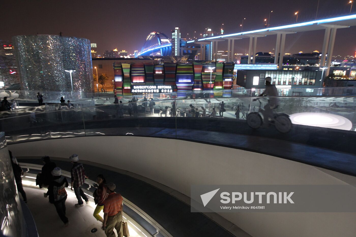 Visitors view items displayed at Denmark Pavilion at Expo 2010