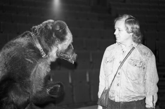 Artist Viktor Shempur with trained bear