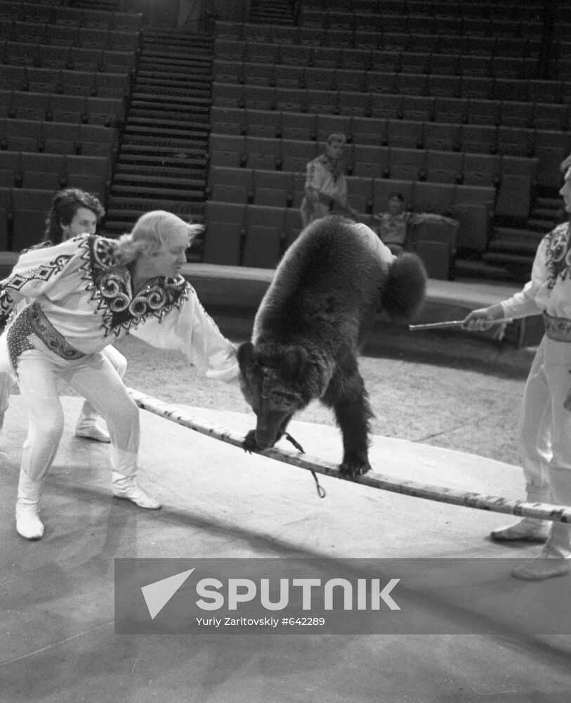 Artist Viktor Shempur with trained bear